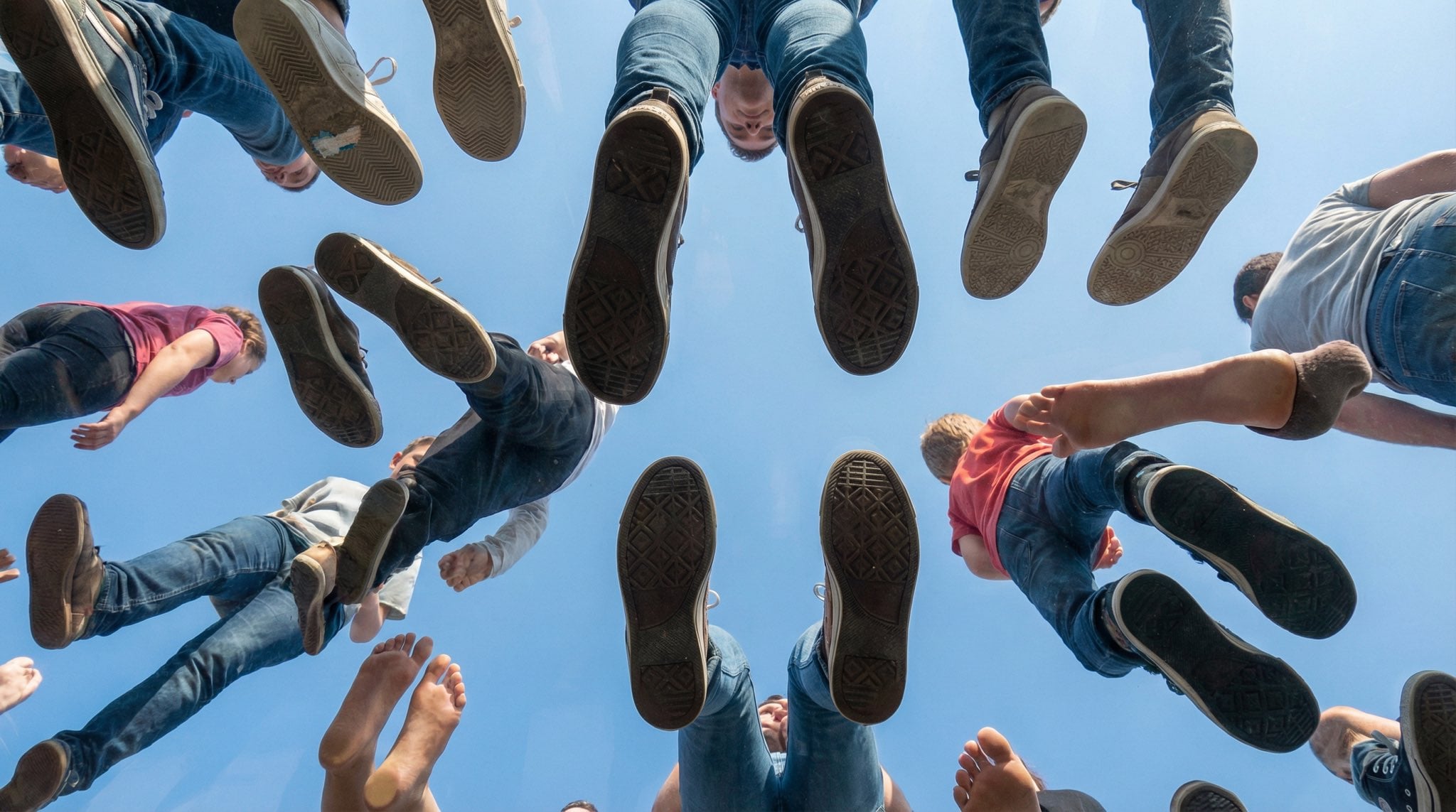 People Walking on Glass Seen from Below (3)